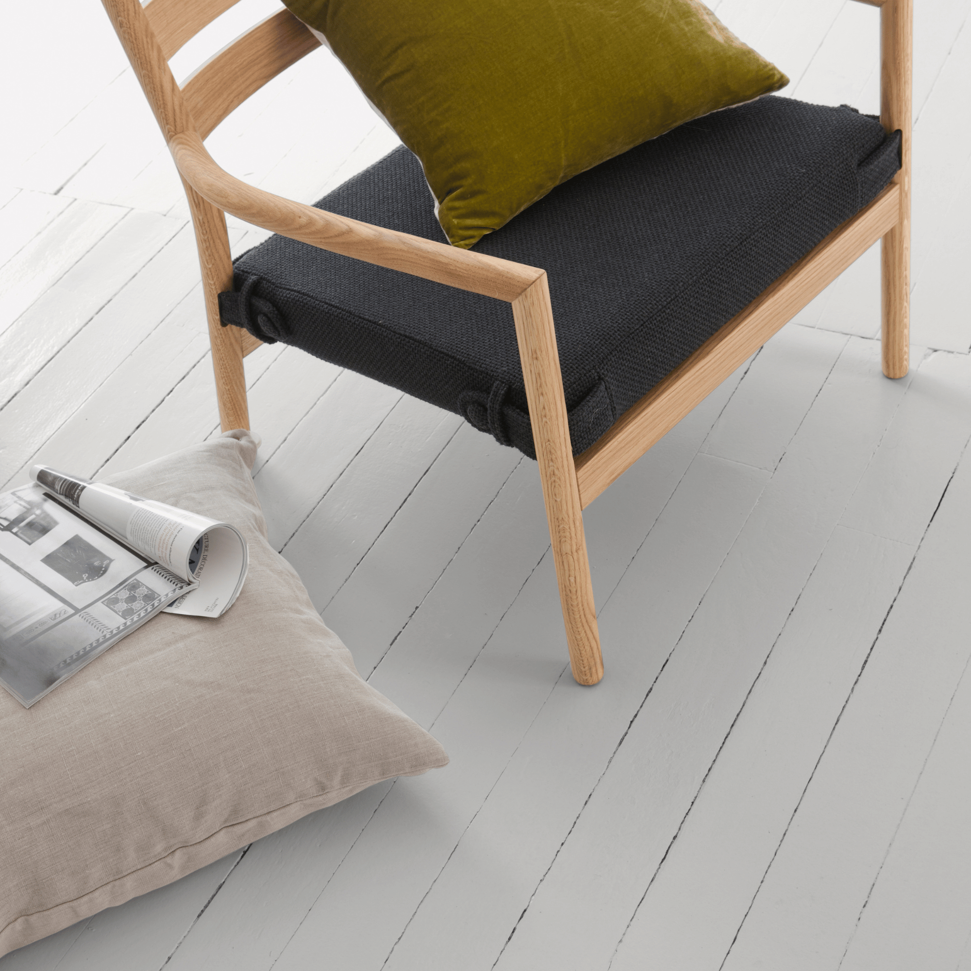 V33 Floor & Stairs Paint in Feather satin on a painted wooden floor in a modern home.