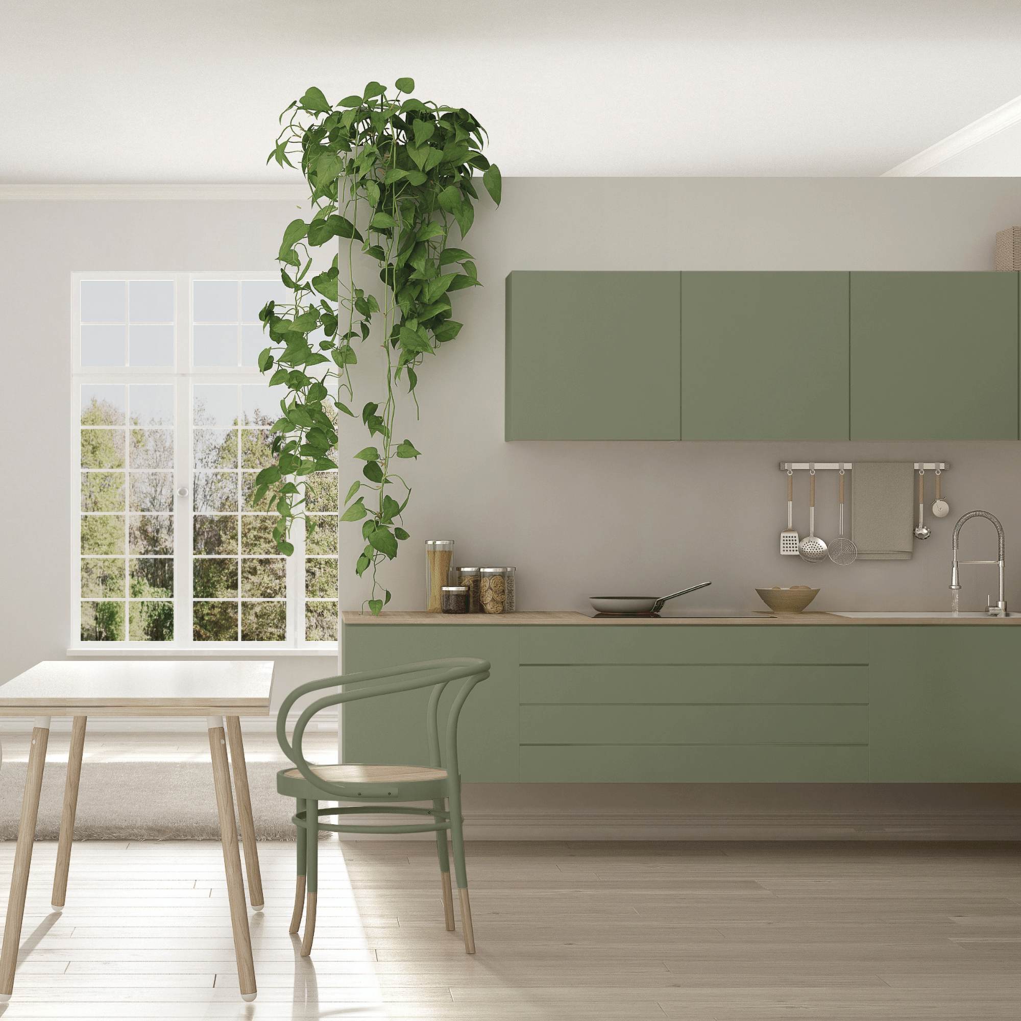 V33 Multi-Surface Paint in Green Khaki satin applied on various surfaces in a modern interior setting.